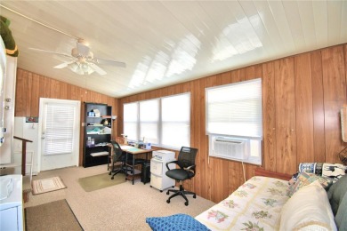PRICE IMPROVEMENT...WELCOME TO YOUR FLORIDA RETIREMENT OASIS IN on Southern Dunes Golf and Country Club in Florida - for sale on GolfHomes.com, golf home, golf lot