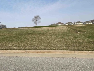 Build your dream home on this large lot overlooking hole #8 on on Centennial Oaks Golf Club in Iowa - for sale on GolfHomes.com, golf home, golf lot