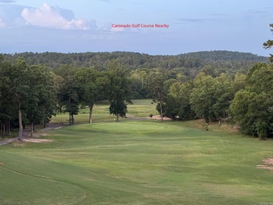 LAKE PINEDA WITH 85 FEET ON THE WATER...CORONADO FITNESS NEARBY on Coronado Golf Course in Arkansas - for sale on GolfHomes.com, golf home, golf lot