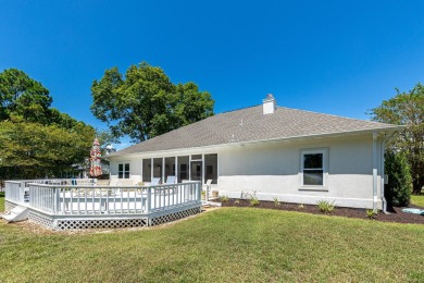 Situated on a spacious 1/2 acre lot boasting 177 ft of lake on Santa Rosa Golf and Beach Club in Florida - for sale on GolfHomes.com, golf home, golf lot