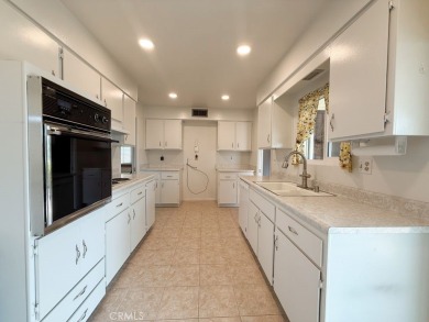 Welcome to 25620 Cherry Hills Blvd, a charming single-story home on Cherry Hills Golf Club in California - for sale on GolfHomes.com, golf home, golf lot