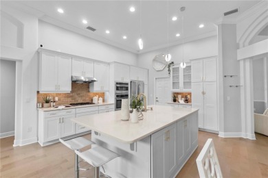 Discover timeless elegance in this stunning, oversized on Westchase Golf Club in Florida - for sale on GolfHomes.com, golf home, golf lot