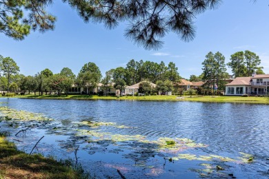 Situated on a spacious 1/2 acre lot boasting 177 ft of lake on Santa Rosa Golf and Beach Club in Florida - for sale on GolfHomes.com, golf home, golf lot