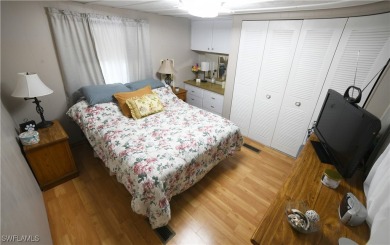 Welcome to Tamiami Village, a vibrant 55+ pet-friendly community on Six Lakes Country Club in Florida - for sale on GolfHomes.com, golf home, golf lot