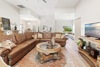 Situated on a spacious 1/2 acre lot boasting 177 ft of lake on Santa Rosa Golf and Beach Club in Florida - for sale on GolfHomes.com, golf home, golf lot