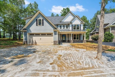 Welcome to your new farmhouse-style home on the golf course at on The Patriot Golf Club At Grand Harbor in South Carolina - for sale on GolfHomes.com, golf home, golf lot