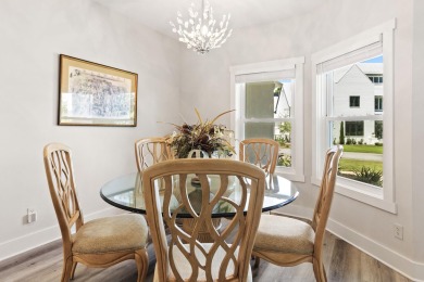 Situated on a spacious 1/2 acre lot boasting 177 ft of lake on Santa Rosa Golf and Beach Club in Florida - for sale on GolfHomes.com, golf home, golf lot
