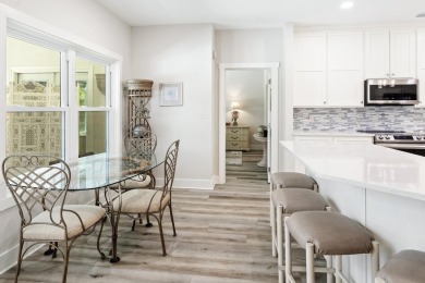 Situated on a spacious 1/2 acre lot boasting 177 ft of lake on Santa Rosa Golf and Beach Club in Florida - for sale on GolfHomes.com, golf home, golf lot