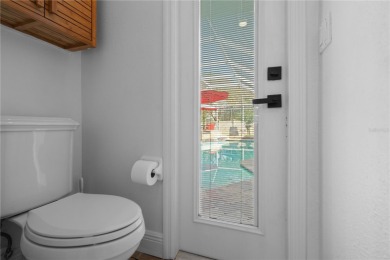 Discover timeless elegance in this stunning, oversized on Westchase Golf Club in Florida - for sale on GolfHomes.com, golf home, golf lot