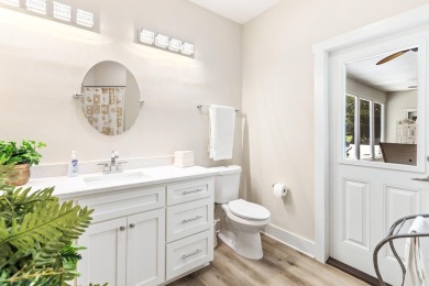Situated on a spacious 1/2 acre lot boasting 177 ft of lake on Santa Rosa Golf and Beach Club in Florida - for sale on GolfHomes.com, golf home, golf lot