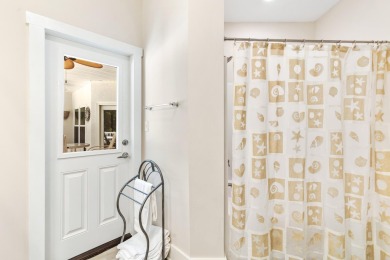 Situated on a spacious 1/2 acre lot boasting 177 ft of lake on Santa Rosa Golf and Beach Club in Florida - for sale on GolfHomes.com, golf home, golf lot