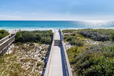Situated on a spacious 1/2 acre lot boasting 177 ft of lake on Santa Rosa Golf and Beach Club in Florida - for sale on GolfHomes.com, golf home, golf lot