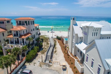 Situated on a spacious 1/2 acre lot boasting 177 ft of lake on Santa Rosa Golf and Beach Club in Florida - for sale on GolfHomes.com, golf home, golf lot