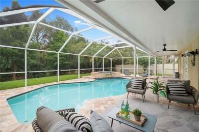 Discover timeless elegance in this stunning, oversized on Westchase Golf Club in Florida - for sale on GolfHomes.com, golf home, golf lot
