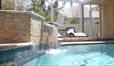 Discover timeless elegance in this stunning, oversized on Westchase Golf Club in Florida - for sale on GolfHomes.com, golf home, golf lot