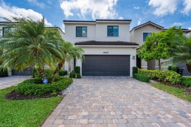 Indulge in luxury with this beautiful home in Natura at Bonita on Bonita Fairways in Florida - for sale on GolfHomes.com, golf home, golf lot