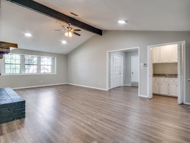 BEAUTIFULLY REMODELED HOME IN THE COVETED PECAN PLANTATION on Pecan Plantation Country Club in Texas - for sale on GolfHomes.com, golf home, golf lot