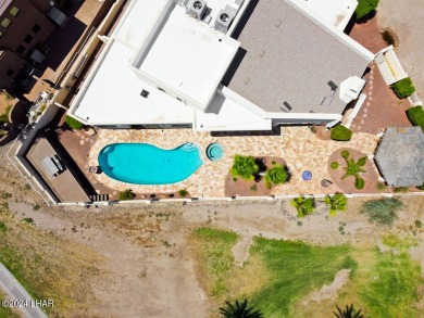 Beautifully Remodeled  Residential Estate home is directly on on London Bridge Golf Course in Arizona - for sale on GolfHomes.com, golf home, golf lot