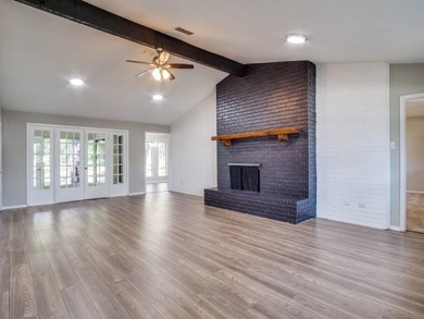 BEAUTIFULLY REMODELED HOME IN THE COVETED PECAN PLANTATION on Pecan Plantation Country Club in Texas - for sale on GolfHomes.com, golf home, golf lot