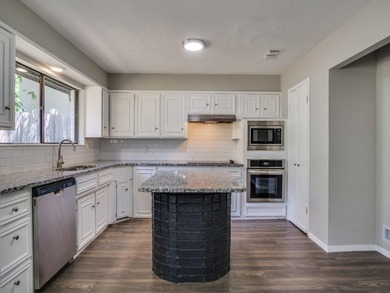 BEAUTIFULLY REMODELED HOME IN THE COVETED PECAN PLANTATION on Pecan Plantation Country Club in Texas - for sale on GolfHomes.com, golf home, golf lot