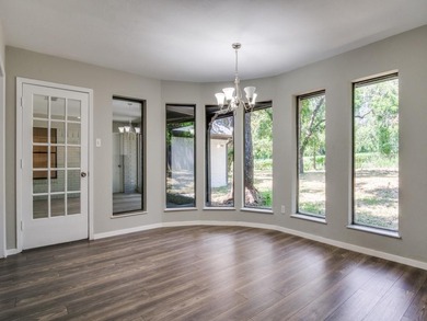 BEAUTIFULLY REMODELED HOME IN THE COVETED PECAN PLANTATION on Pecan Plantation Country Club in Texas - for sale on GolfHomes.com, golf home, golf lot