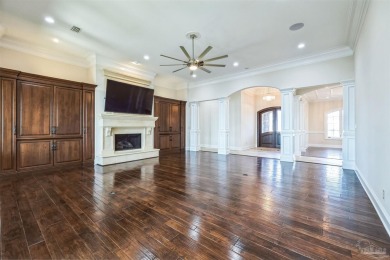 Luxury Waterfront Home located in Tiger Point with Dock, Pool on Tiger Point Golf and Country Club in Florida - for sale on GolfHomes.com, golf home, golf lot