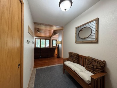 Tucked back on a nicely wooded lot, this TIMBER RIDGE home on Timber Ridge Golf Club in Wisconsin - for sale on GolfHomes.com, golf home, golf lot