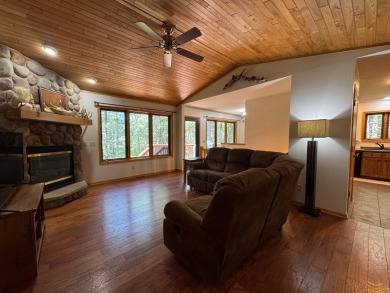 Tucked back on a nicely wooded lot, this TIMBER RIDGE home on Timber Ridge Golf Club in Wisconsin - for sale on GolfHomes.com, golf home, golf lot