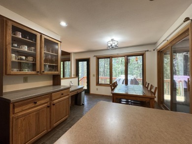 Tucked back on a nicely wooded lot, this TIMBER RIDGE home on Timber Ridge Golf Club in Wisconsin - for sale on GolfHomes.com, golf home, golf lot