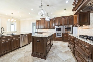 Luxury Waterfront Home located in Tiger Point with Dock, Pool on Tiger Point Golf and Country Club in Florida - for sale on GolfHomes.com, golf home, golf lot