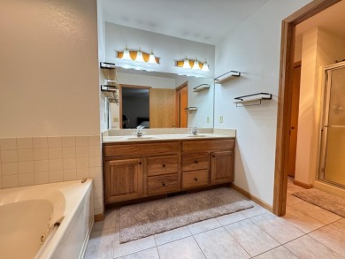 Tucked back on a nicely wooded lot, this TIMBER RIDGE home on Timber Ridge Golf Club in Wisconsin - for sale on GolfHomes.com, golf home, golf lot
