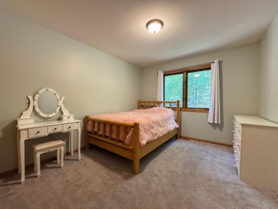 Tucked back on a nicely wooded lot, this TIMBER RIDGE home on Timber Ridge Golf Club in Wisconsin - for sale on GolfHomes.com, golf home, golf lot
