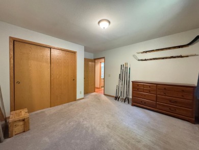 Tucked back on a nicely wooded lot, this TIMBER RIDGE home on Timber Ridge Golf Club in Wisconsin - for sale on GolfHomes.com, golf home, golf lot