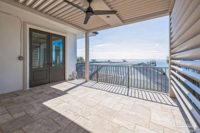 Luxury Waterfront Home located in Tiger Point with Dock, Pool on Tiger Point Golf and Country Club in Florida - for sale on GolfHomes.com, golf home, golf lot