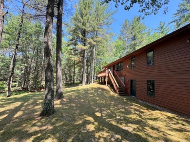 Tucked back on a nicely wooded lot, this TIMBER RIDGE home on Timber Ridge Golf Club in Wisconsin - for sale on GolfHomes.com, golf home, golf lot