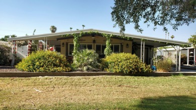 The views from this home are spectacular in this 55+ senior home on Date Palm Country Club in California - for sale on GolfHomes.com, golf home, golf lot