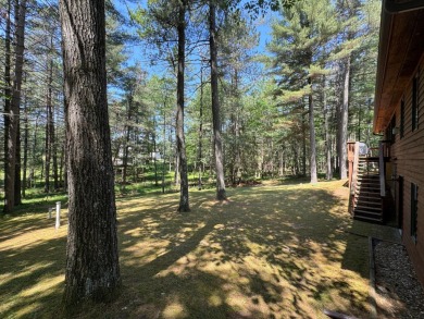 Tucked back on a nicely wooded lot, this TIMBER RIDGE home on Timber Ridge Golf Club in Wisconsin - for sale on GolfHomes.com, golf home, golf lot