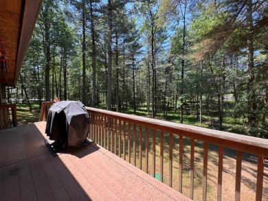 Tucked back on a nicely wooded lot, this TIMBER RIDGE home on Timber Ridge Golf Club in Wisconsin - for sale on GolfHomes.com, golf home, golf lot