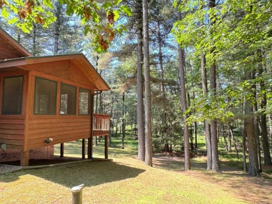 Tucked back on a nicely wooded lot, this TIMBER RIDGE home on Timber Ridge Golf Club in Wisconsin - for sale on GolfHomes.com, golf home, golf lot