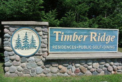 Tucked back on a nicely wooded lot, this TIMBER RIDGE home on Timber Ridge Golf Club in Wisconsin - for sale on GolfHomes.com, golf home, golf lot