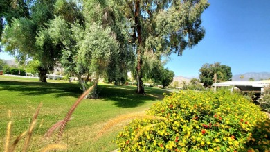 The views from this home are spectacular in this 55+ senior home on Date Palm Country Club in California - for sale on GolfHomes.com, golf home, golf lot