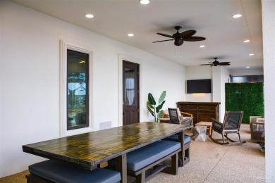 Luxury Waterfront Home located in Tiger Point with Dock, Pool on Tiger Point Golf and Country Club in Florida - for sale on GolfHomes.com, golf home, golf lot