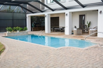 Luxury Waterfront Home located in Tiger Point with Dock, Pool on Tiger Point Golf and Country Club in Florida - for sale on GolfHomes.com, golf home, golf lot