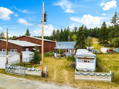 You will love this beautiful rustic cabin built in 1920 on .163 on Meadow Creek Golf Course in Montana - for sale on GolfHomes.com, golf home, golf lot