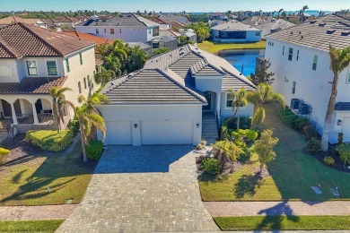 Welcome to a St Thomas lake-view model in the famous Legends Bay on IMG Academies Golf and Country Club in Florida - for sale on GolfHomes.com, golf home, golf lot