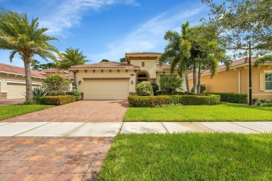 This sought-after Lago plan offers an exceptional open-concept on PGA Golf Club in PGA Village in Florida - for sale on GolfHomes.com, golf home, golf lot