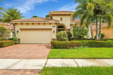This sought-after Lago plan offers an exceptional open-concept on PGA Golf Club in PGA Village in Florida - for sale on GolfHomes.com, golf home, golf lot