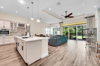 This sought-after Lago plan offers an exceptional open-concept on PGA Golf Club in PGA Village in Florida - for sale on GolfHomes.com, golf home, golf lot