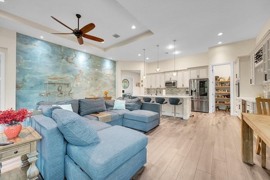 This sought-after Lago plan offers an exceptional open-concept on PGA Golf Club in PGA Village in Florida - for sale on GolfHomes.com, golf home, golf lot