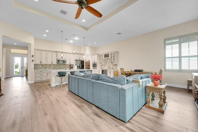 This sought-after Lago plan offers an exceptional open-concept on PGA Golf Club in PGA Village in Florida - for sale on GolfHomes.com, golf home, golf lot